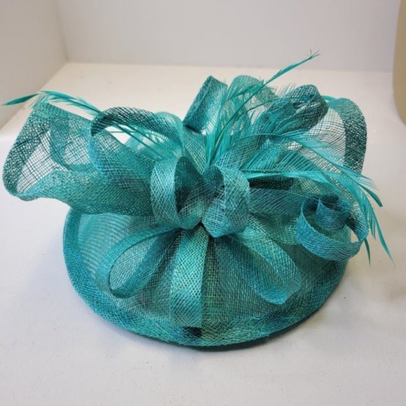 Blue Fascinator with an Upturned Brim Sinamay Loops Rosettes and Feathers - Picture 12 of 16